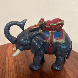 Elephant Hubley bank heavy cast iron bank flip tail and the trunk flings…